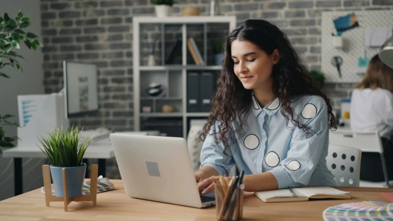 Person working on job description online to attract more diverse talent in the NHS