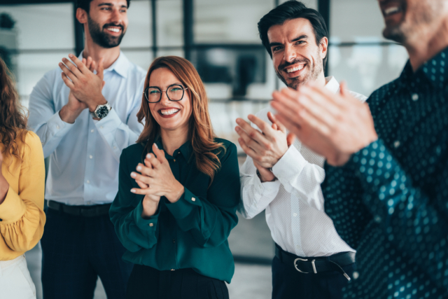 Businesspeople applauding